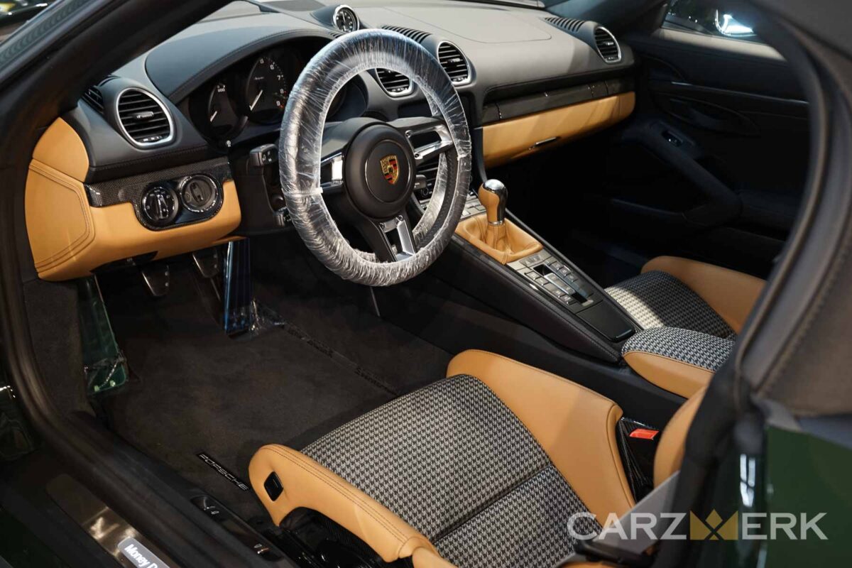 A complete Carzwerk job - see the interior car cleaning San Francisco relies on in this photo of the driver's seat of a beige and black leather auto interior. It's freshly detailed and very clean.