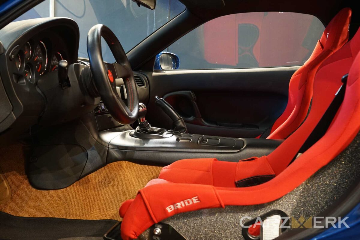 A red interior after some types of car detailing services specific to the interior were completed.