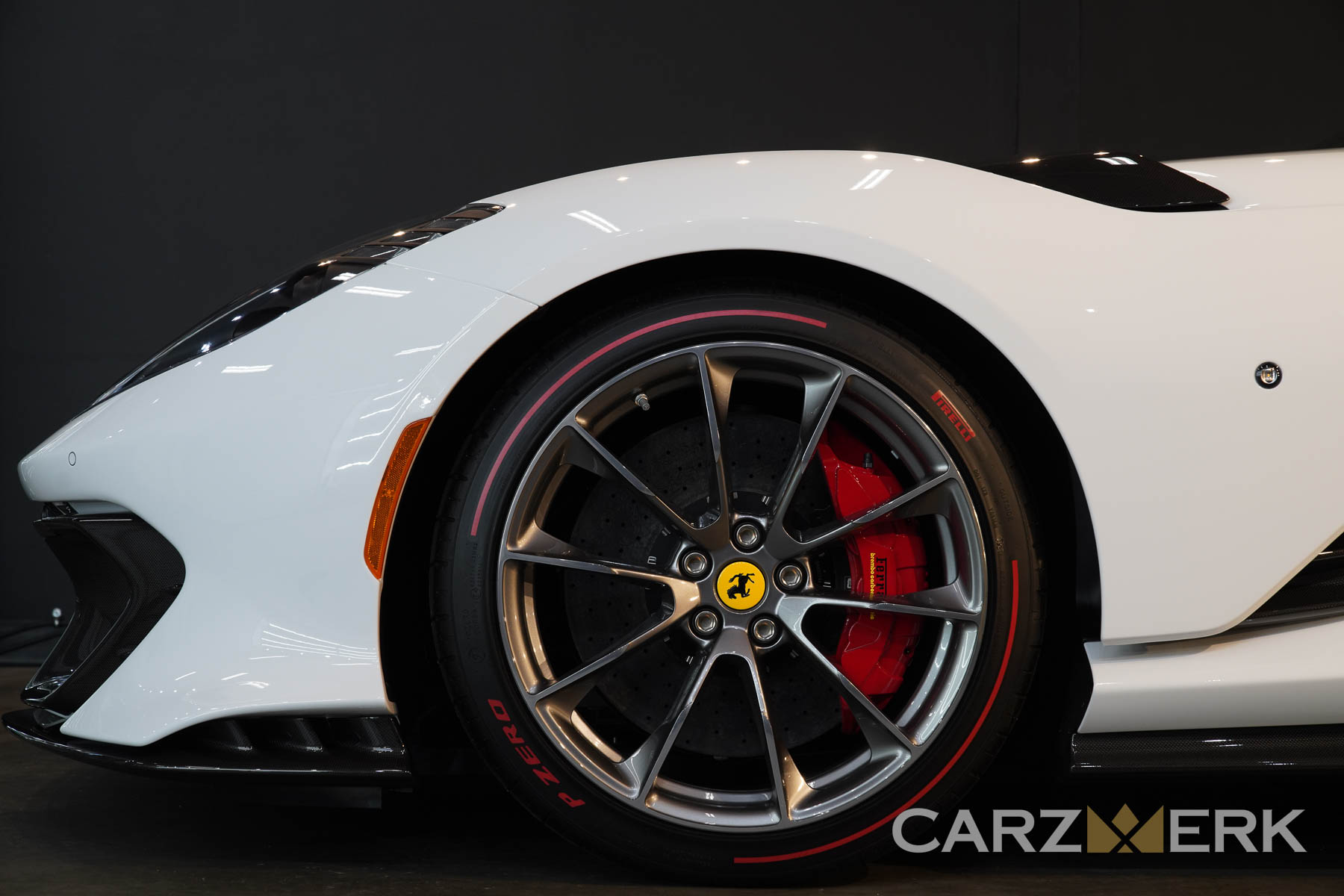 2022 Ferrari 812 Competizione - Bianco Cervino - Front Wheel with Red Brake Caliper - Side Shot