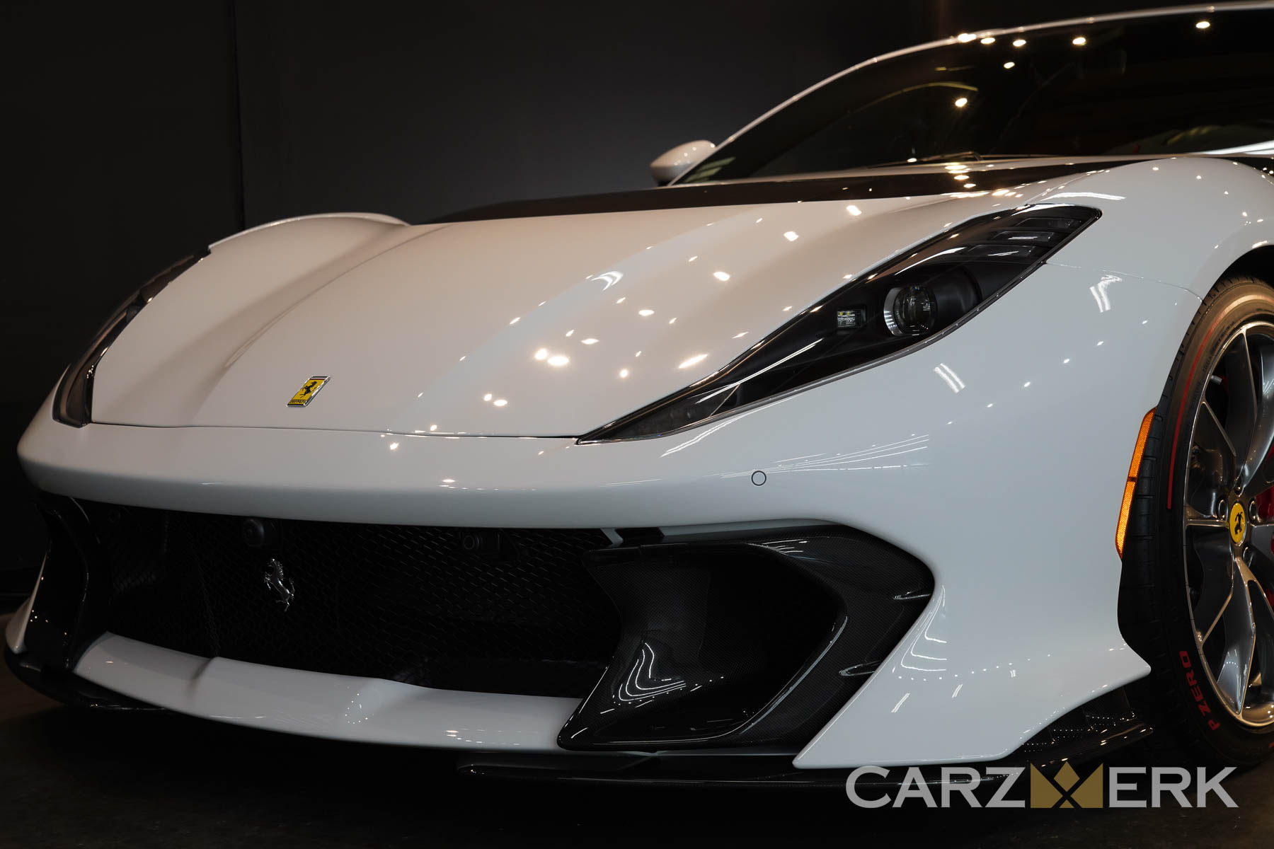 2022 Ferrari 812 Competizione - Bianco Cervino - Front end - Side shot