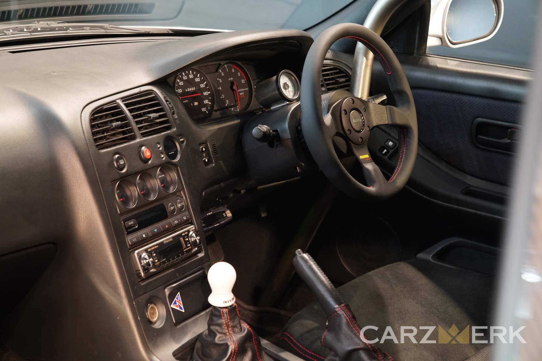 1995 Nissan GTR33 V-Spec | BCNR33 Spark Silver Metallic - Interior with Momo steering wheel and Nismo Shift knob