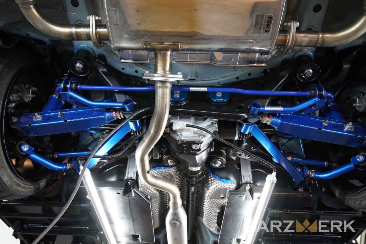 2022 Toyota GR86 Neptune Blue - ZN8 - Undercarriage after dry ice detailing - Showing Cusco Rear Suspension Parts and Tom's exhaust