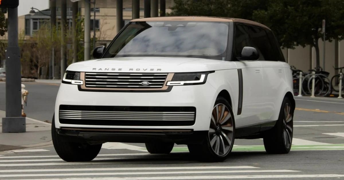 A shot of the front shows the exterior elegance of the white range rover.