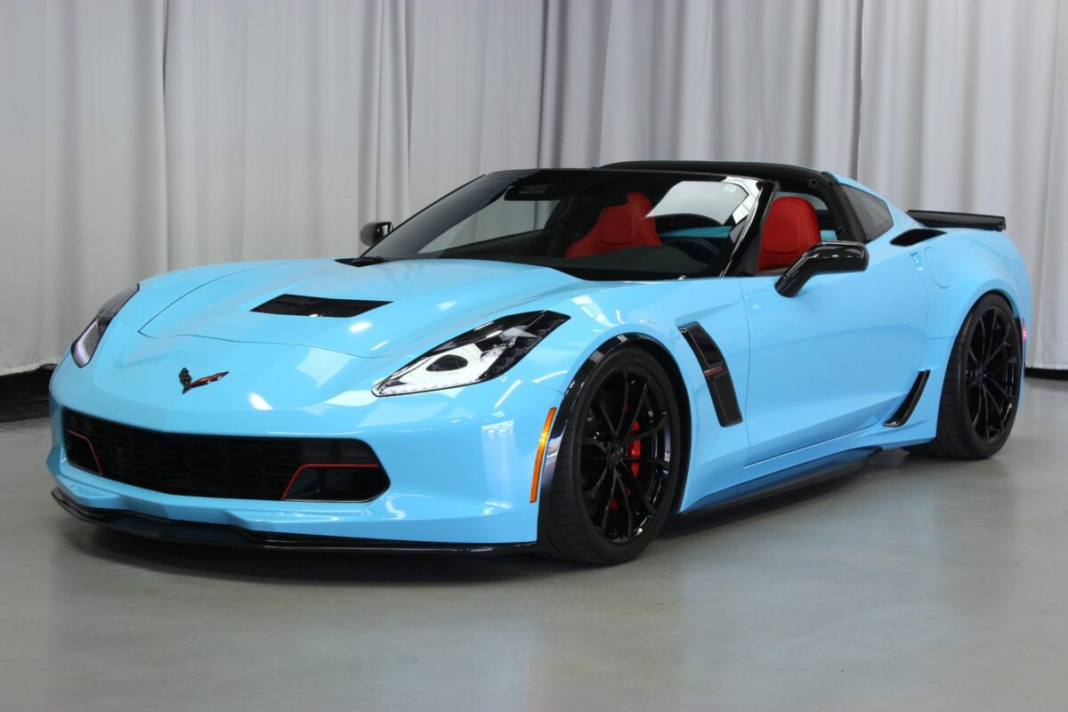 A showcase of a light blue Corvette.