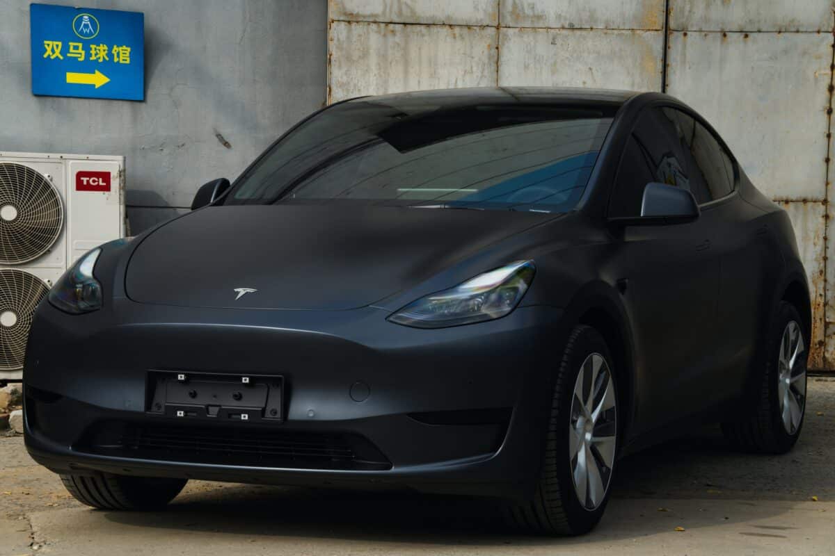 A black Tesla Model Y with stealth PPF.