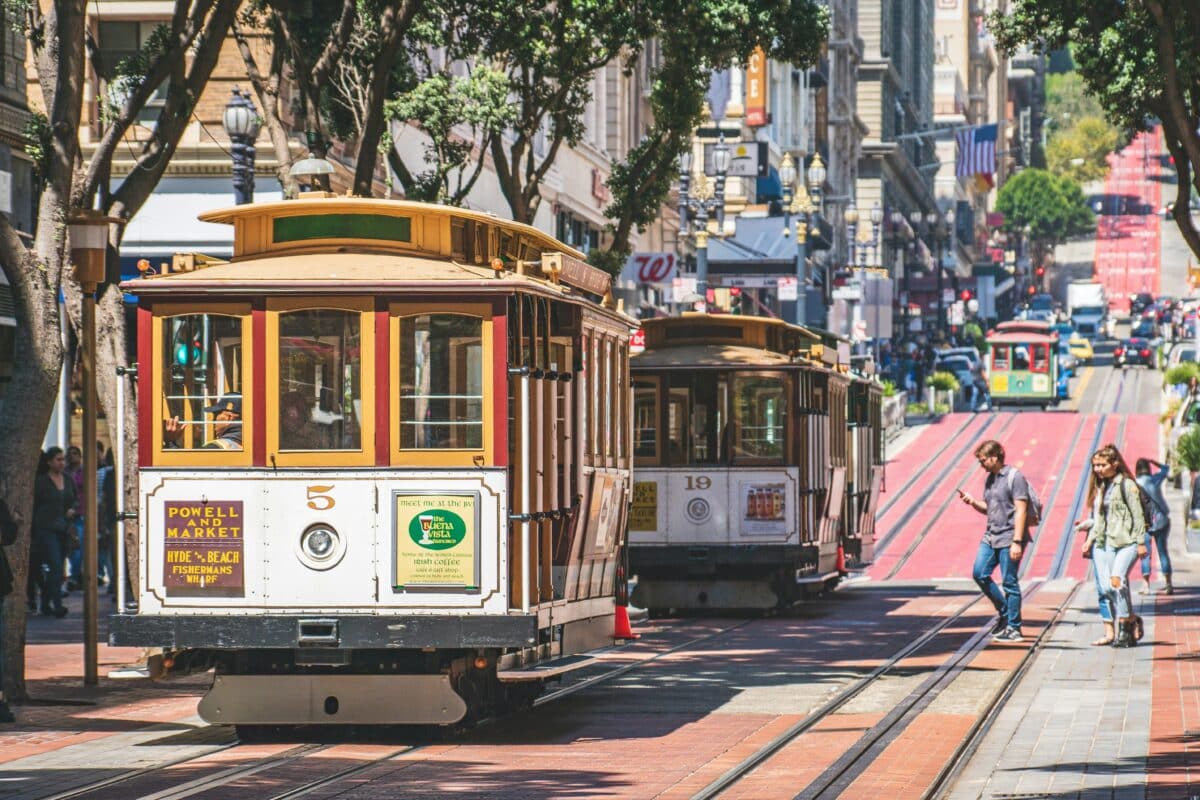 A streetcar with tinted windows on a road in San Francisco. Even the streetcar has car window tinting San Francisco!