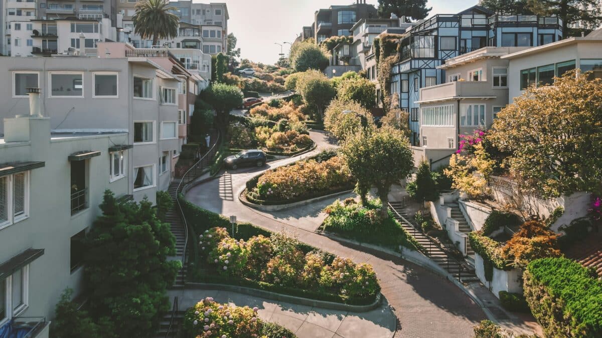 Winding roads of San Francisco show a steep zig zag lane. Window tinting increases safety when driving on roads like this during hours with strong sun.