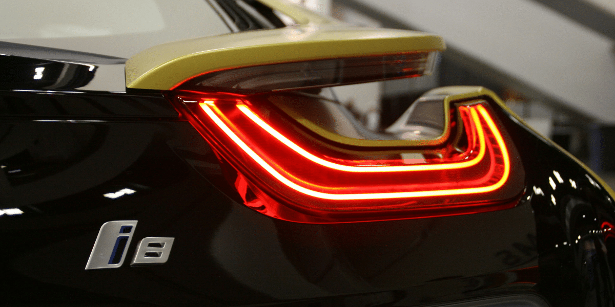 A close-up shot of a tail light after getting luxury car detailing by Carzwerk.