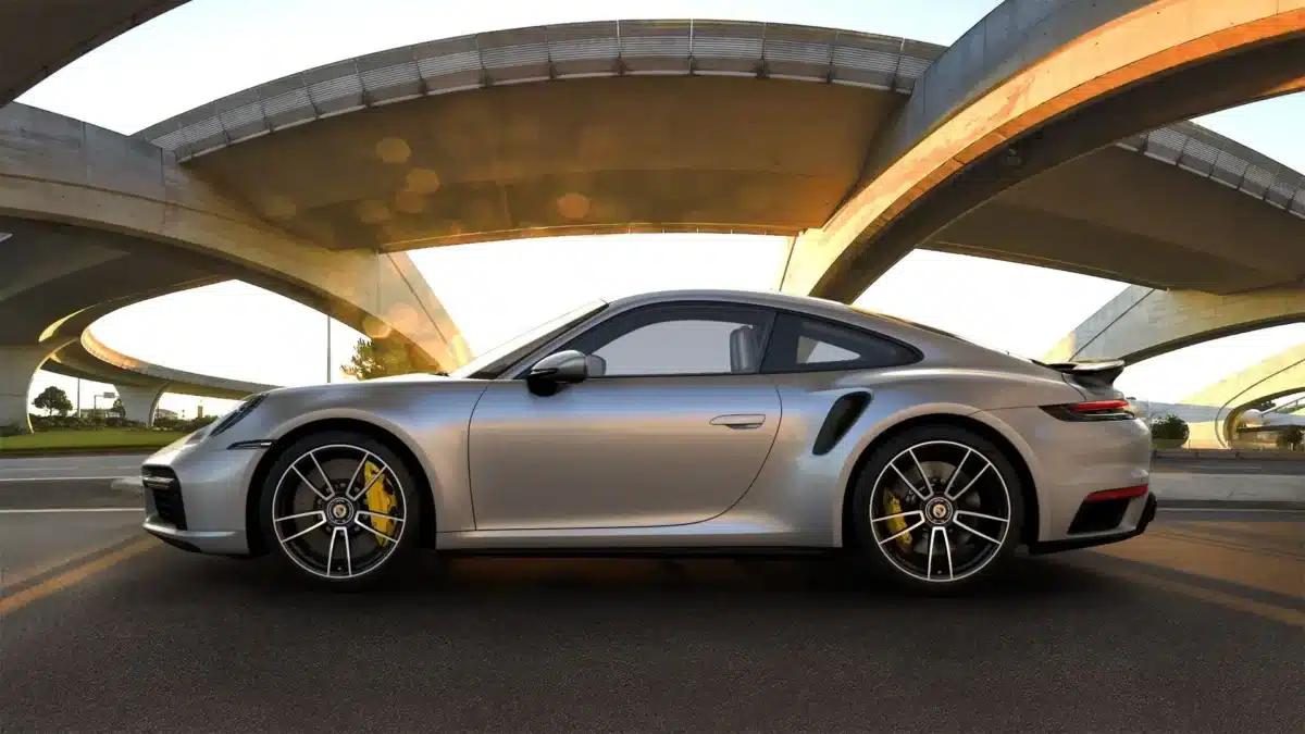 GT Silver Metallic Porsche exterior colors on full display on a Porsche outside on a bright day.