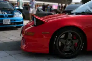 The front of a red Mazda JDM in California at a car meet. 