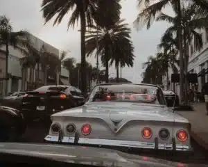 The back of a classic car is parked in Los Angeles California.