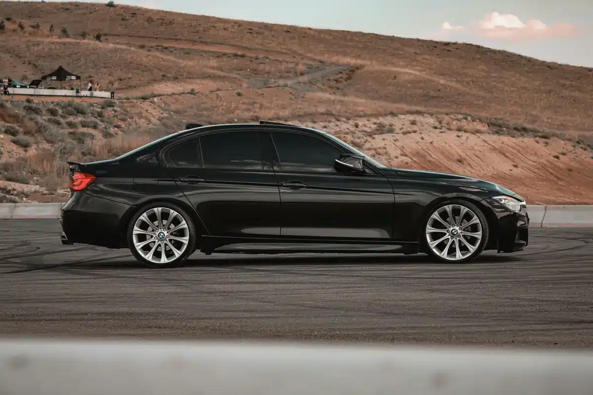 A black car with tinted windows.