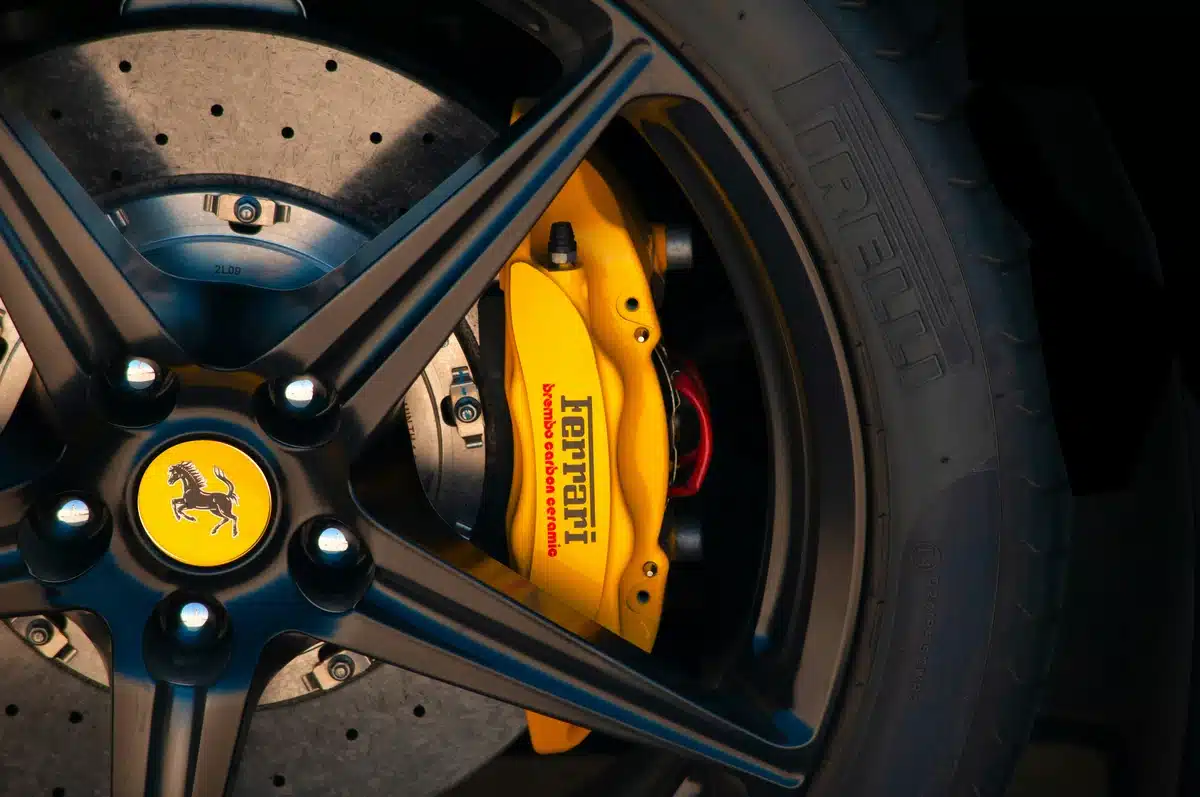 Yellow high heat brake caliper paint seen on a Ferrari.