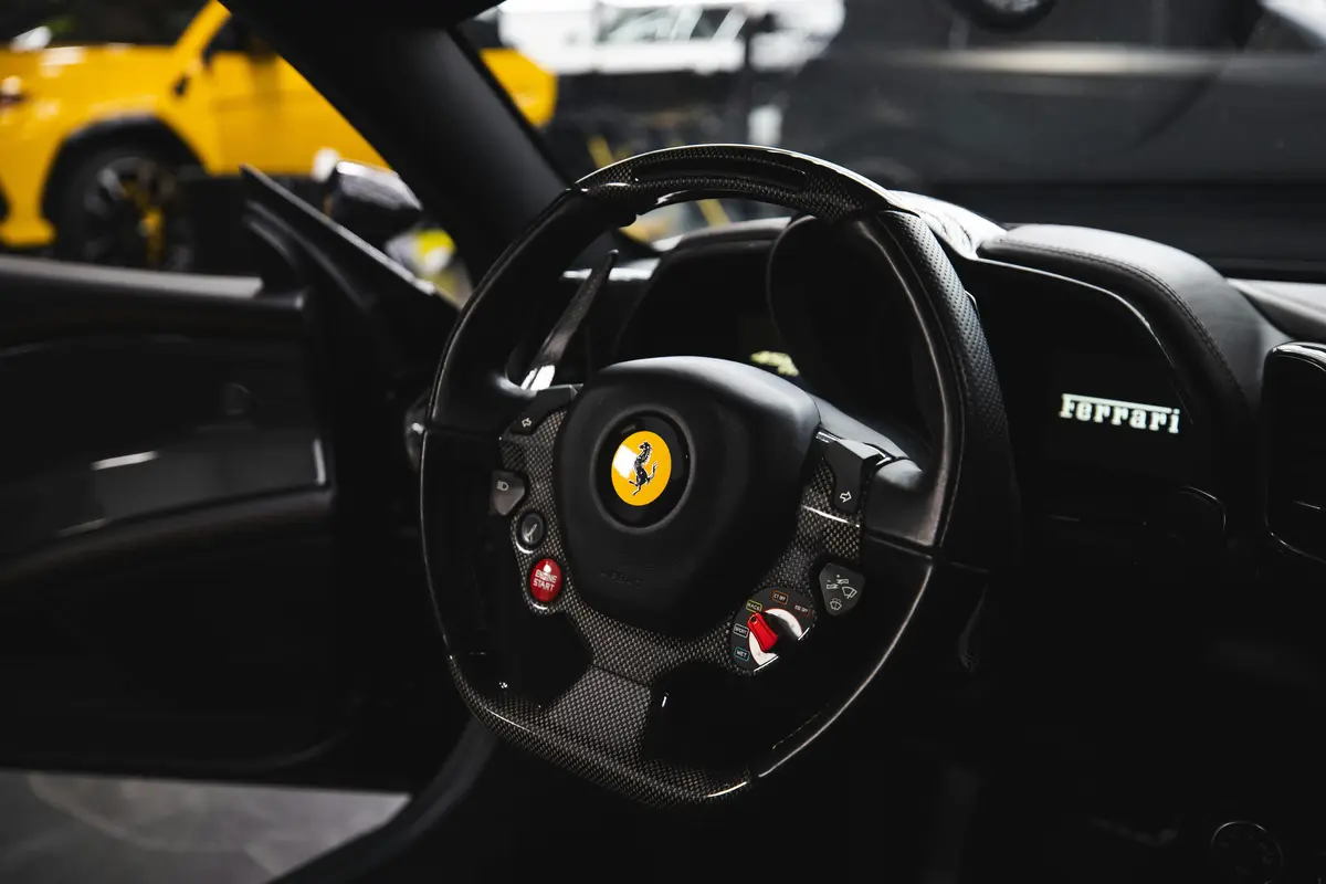 The interior of a Ferrari after Carzwerk's auto detailing in Livermore CA.