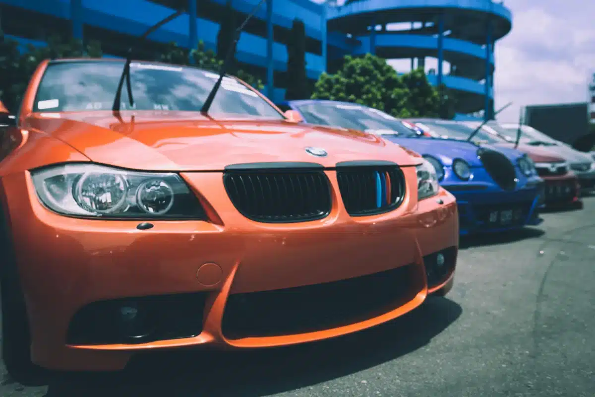 An orange BMW in Santa Clara after window tinting.