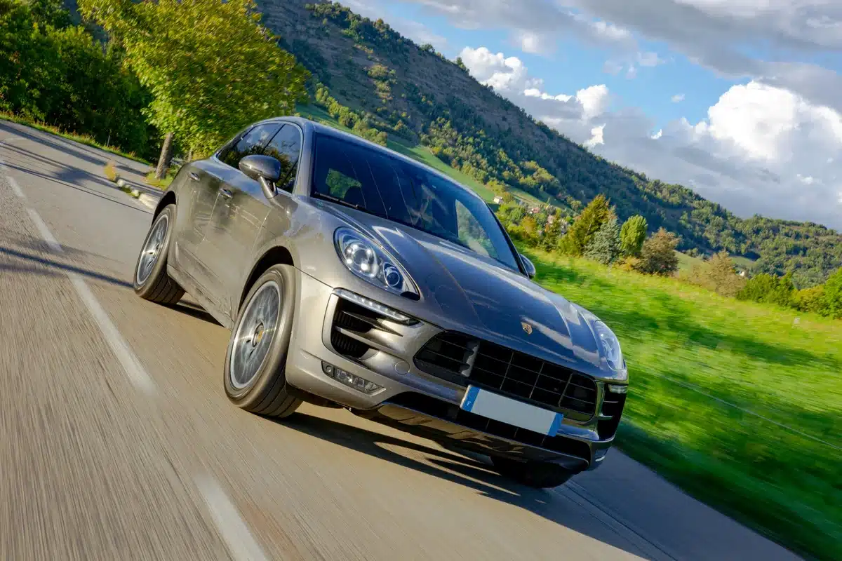 A PPF Porsche Macan job fresh out of the garage, cruising the countryside.