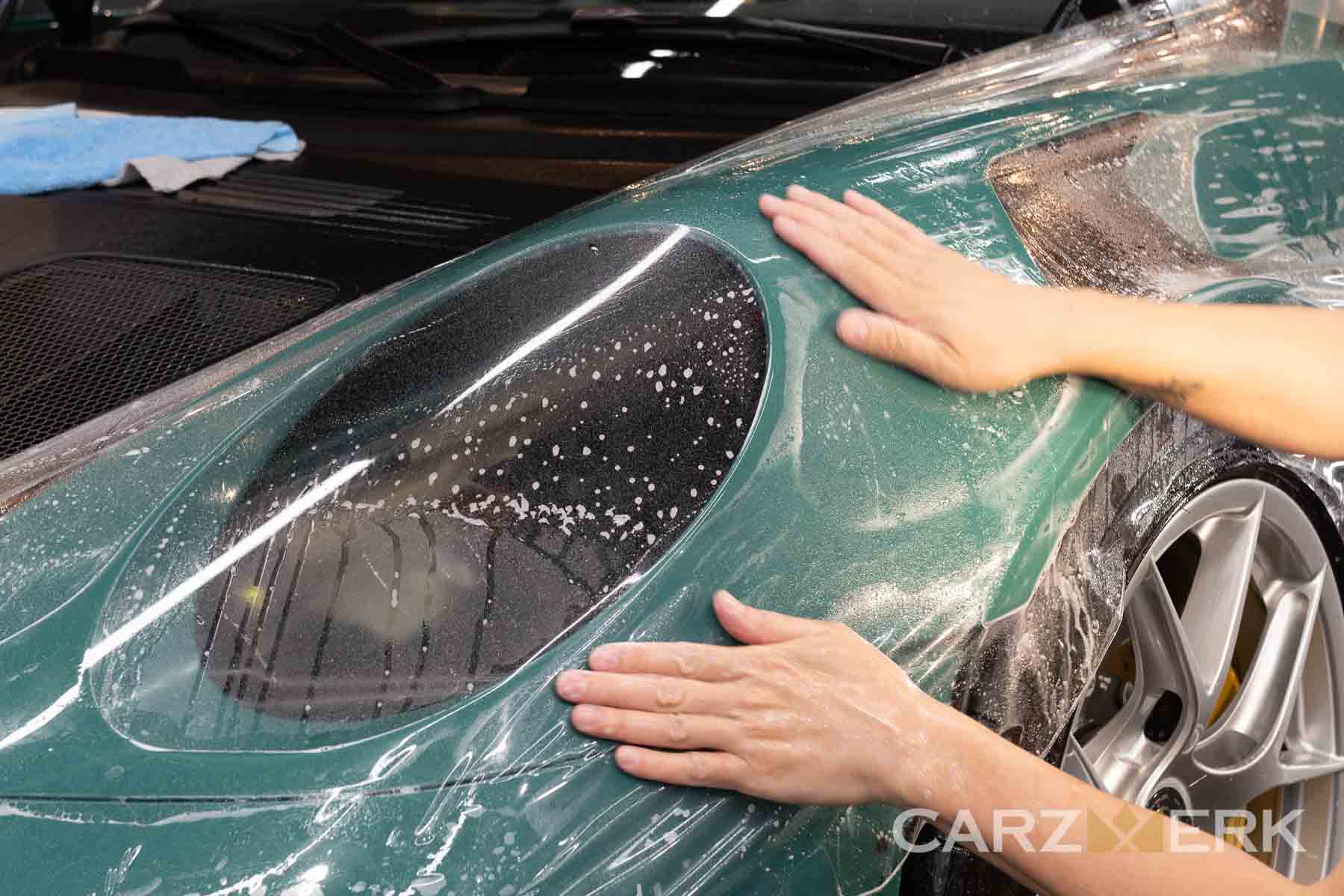 Headlight and vent removal on fender for maximum coverage and clean installation